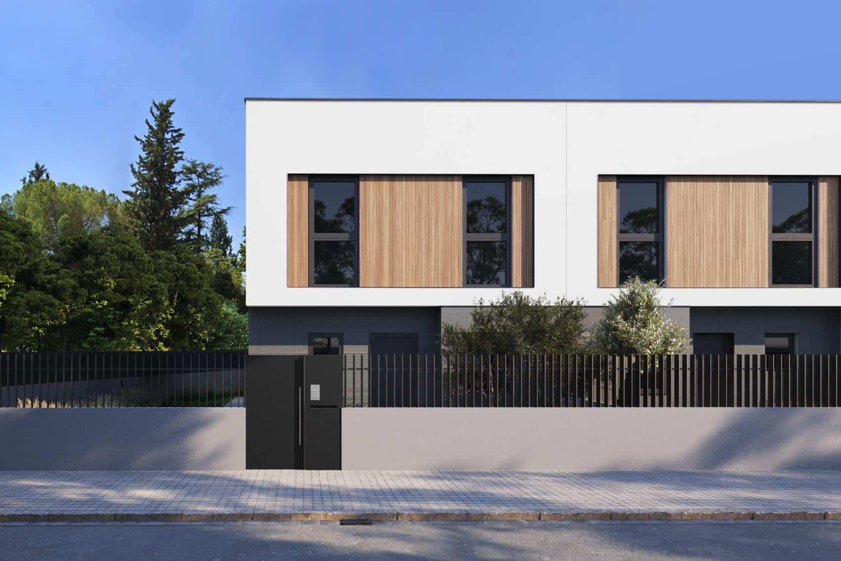 Finestra d'edifici modern amb façana de fusta i parets blanques, envoltada de vegetació en una urbanització contemporània.